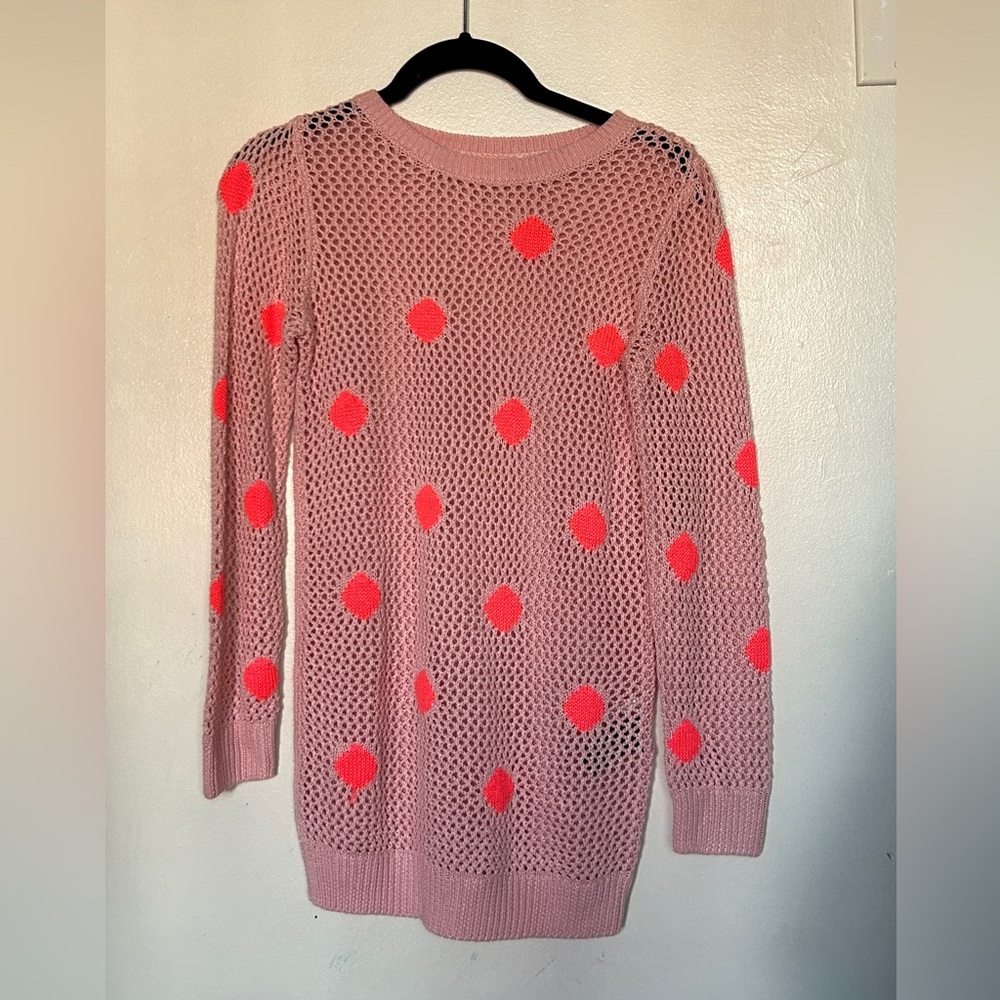 Pink knit sweater with neon pink polka dots